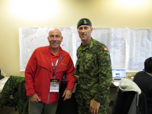John Halvorsen and Maj. Gerant in front of a map of the Army Run course